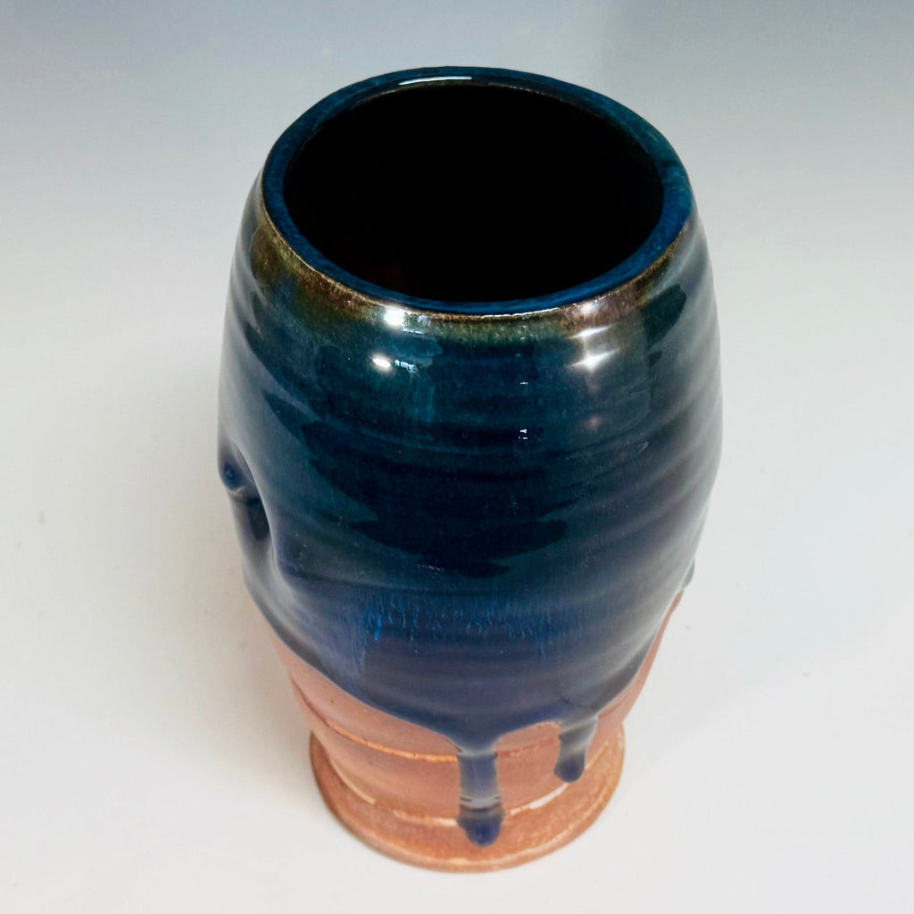 Handcrafted medium vase with cascading blue glaze over terracotta clay body, wood-fired in Danbury, NC.