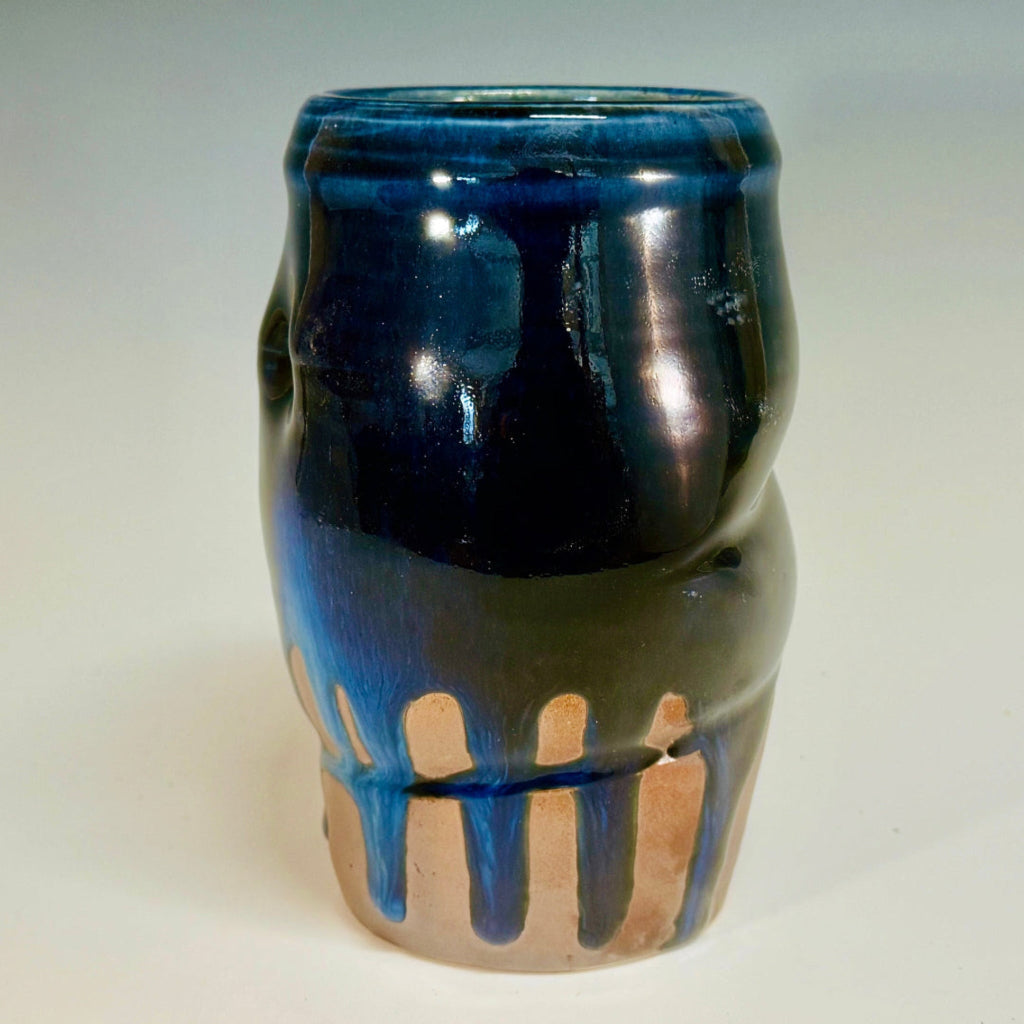  Bottom view: Artisan medium vase with deep blue glaze flowing over flashing slip, handmade and wood-fired in Danbury, NC