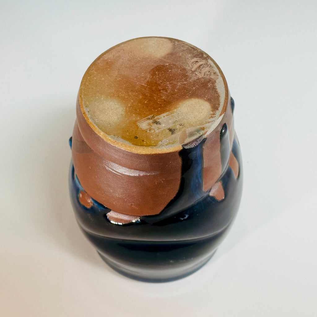  Bottom view: Artisan medium vase with deep blue glaze flowing over flashing slip, handmade and wood-fired in Danbury, NC.
