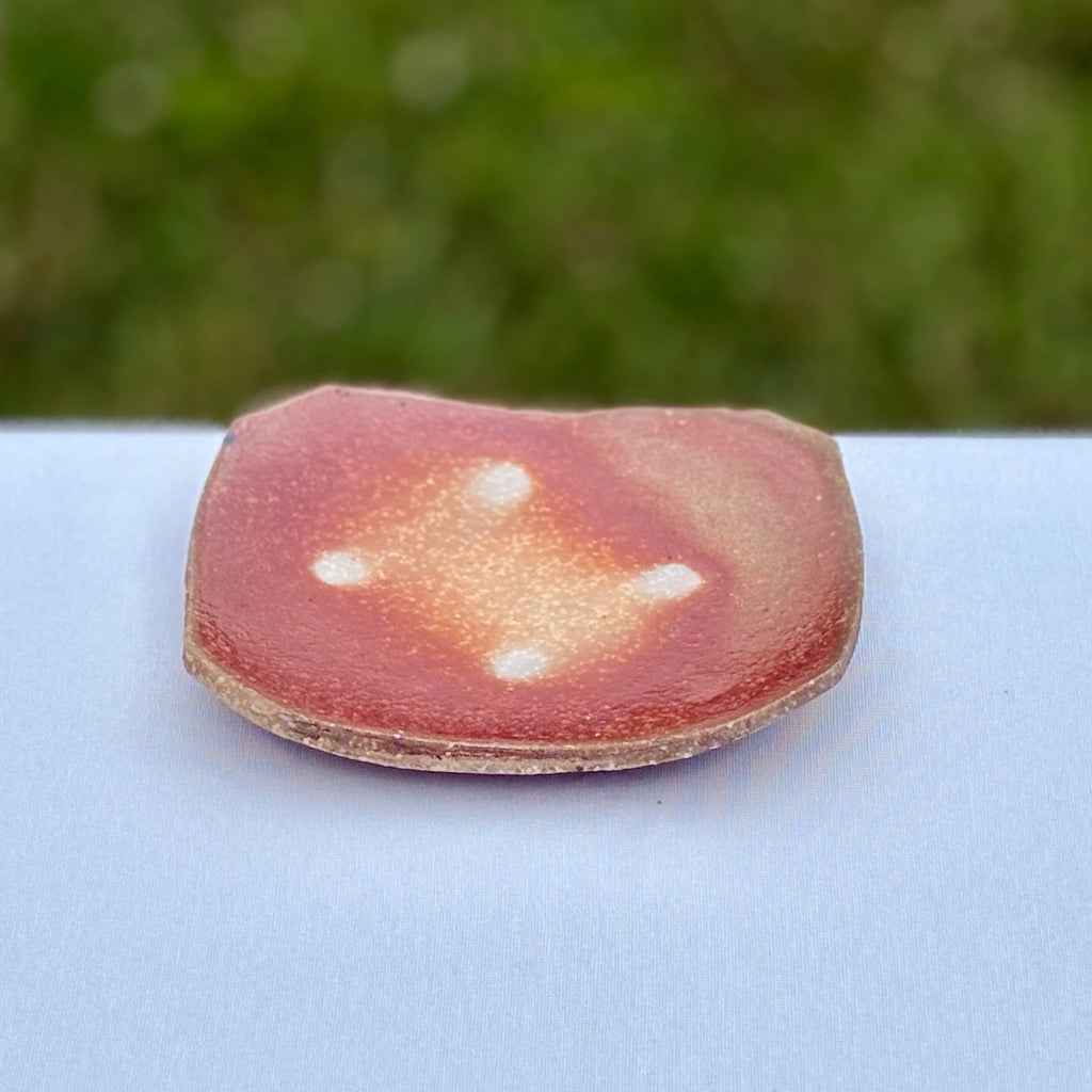 Rectangular wood-fired ceramic soap dish with pink orange ash glazes and natural pottery texture