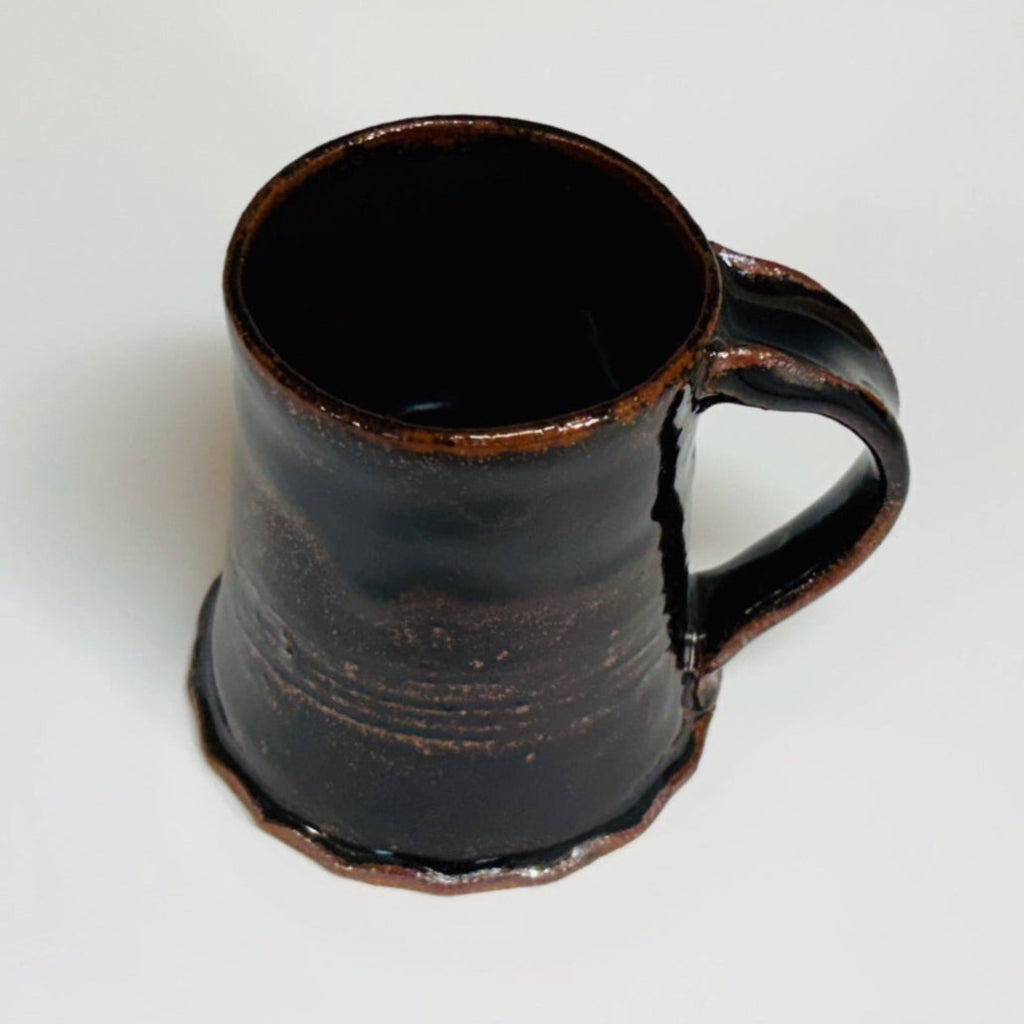  Handcrafted rustic ceramic coffee mug with deep brown and shining brown interior  